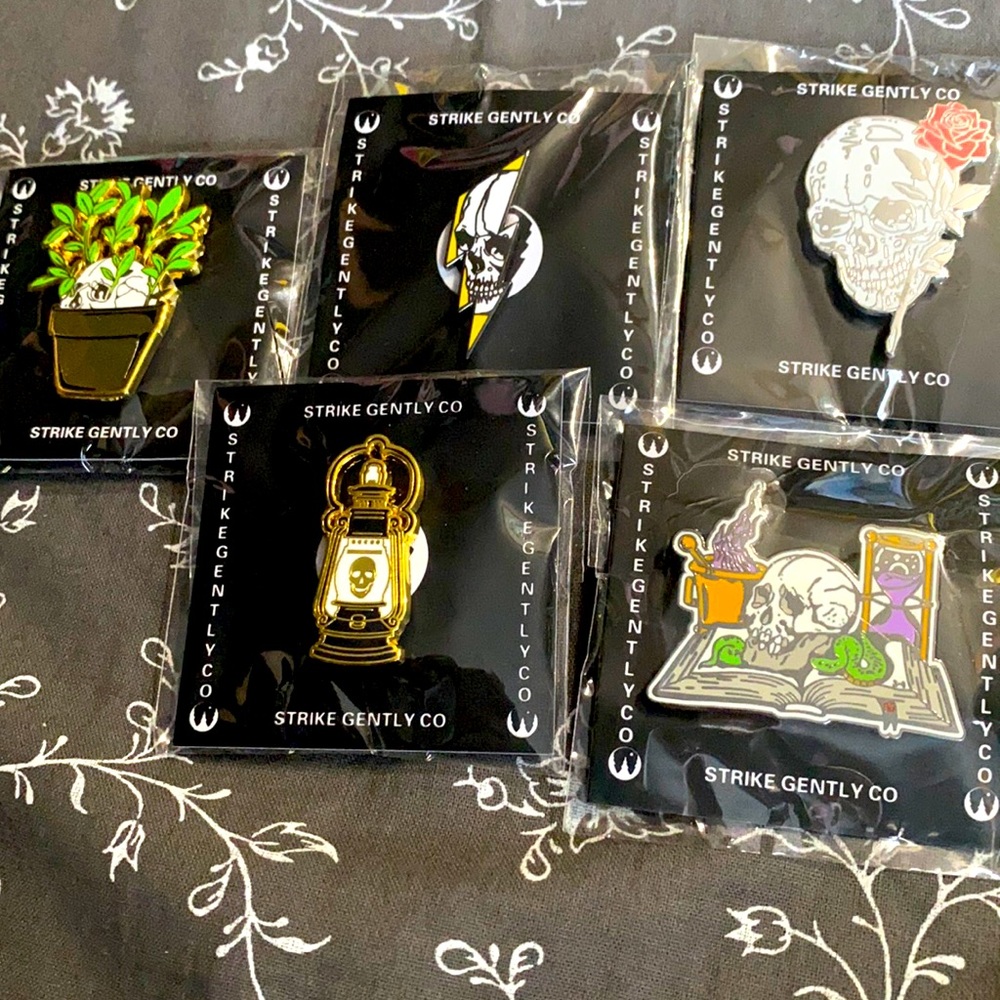 Strike Gently Enamel Pins